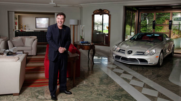 Brazilian billionaire Eike Batista at the  his home in Jardim Botanico, Rio de Janeiro, next to his $1.2 million dollar Mercedes Benz, that he keeps in the living room