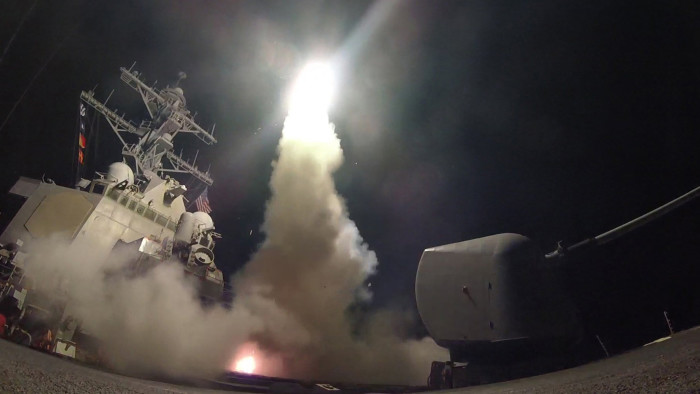 epa05894269 A handout photo made available by the US Navy Office of Information shows the guided-missile destroyer USS Porter (DDG 78) launching a missile strike while in the Mediterranean Sea, 07 April 2017. The United States military launched at least 50 tomahawk cruise missiles against al-Shayrat military airfield near Homs, Syria, in response to the Syrian military's alleged use of chemical weapons in an airstrike in a rebel held area in Idlib province on 04 April 2017. EPA/FORD WILLIAMS / HANDOUT HANDOUT EDITORIAL USE ONLY/NO SALES