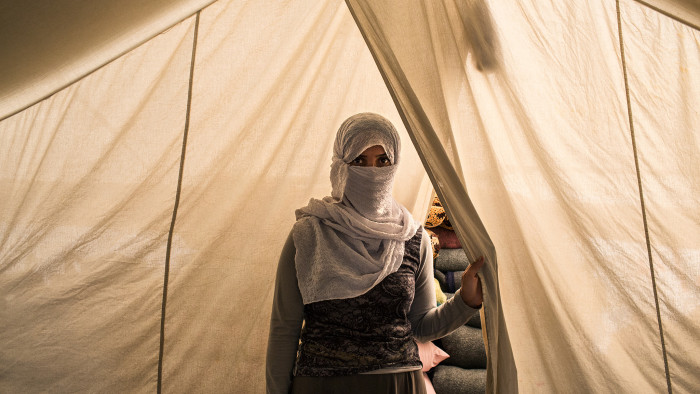 ‘Basma’ in the tent she shares with her in-laws in a refugee camp in the semi-autonomous Kurdistan region of northern Iraq, October 2015