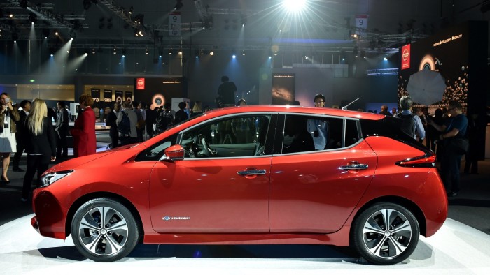 Japan's Nissan Motor displays the company's new Nissan LEAF, the next evolution of the zero-emission electric vehicle, during the world premiere in Makuhari, Chiba prefecture on September 6, 2017. Japanese giant Nissan on September 6 unveiled a new electric car with an extended range and semi-autonomous driving functions, as it seeks to battle off competitors in a sector it once pioneered. / AFP PHOTO / KAZUHIRO NOGI (Photo credit should read KAZUHIRO NOGI/AFP/Getty Images)