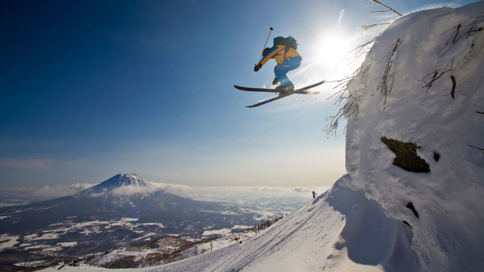 A skier on the slopes above the resort of Niseko, with a view across to Mount Yotei, the ‘Fuji of the north’