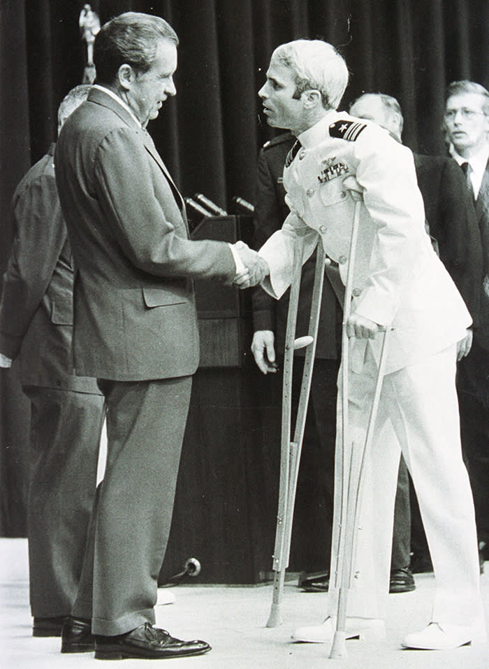 P368426 03: (File Photo) Lieutenant Commander John Mccain Is Welcomed By U.S. President Richard Nixon Upon Mccain's Release From Five And One-Half Years As A P.O.W. During The Vietnam War May 24, 1973 In Washington, D.C. (Photo By Getty Images)