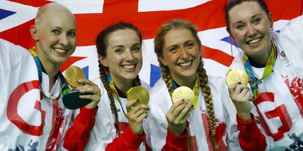 Britain's team, from left, Joanna Rowsell Shand, Elinor Barker, Laura Trott and Katie Archibald pose with their gold medals after the medal ceremony of the women's team pursuit finals cycling event at the Rio Olympic Velodrome during the 2016 Summer Olympics in Rio de Janeiro, Brazil, Saturday, Aug. 13, 2016. (AP Photo/Patrick Semansky)