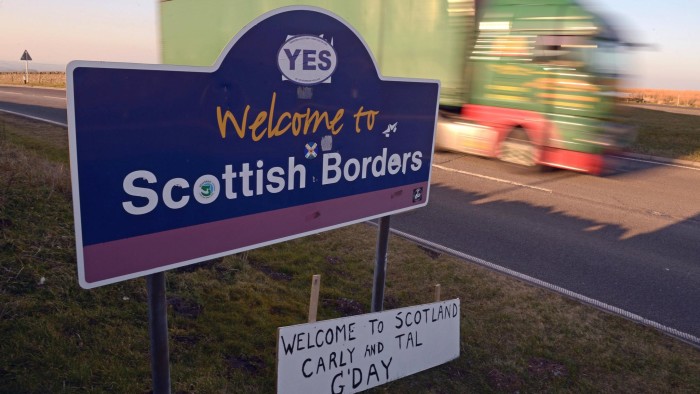 CARTER BAR, SCOTLAND - MARCH 12: A vehicle passes the welcome to Scotland sign on the A1 on March 12, 2014 in Scotland. A referendum on whether Scotland should be an independent country will take place on Thursday 18 September 2014. (Photo by Jeff J Mitchell/Getty Images)