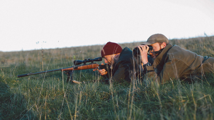 Tim Hayward (left) lines up his target with the help of shooting instructor Chris Wheatley-Hubbard