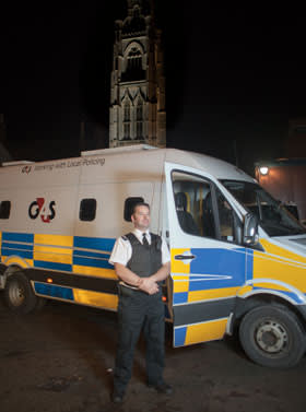 G4S Police Support Services staff member Marcus Bloomfield posing for a portrait outside the street to suite van in Boston, Lincolnshire UK on Oct 31 2013