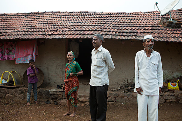 Kedari with his parents at their house near Pune, Maharashtra