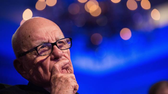FILE: Rupert Murdoch, chairman of News Corp., listens as U.S. President Barack Obama, not pictured, speaks at the Wall Street Journal CEO Council annual meeting at the Four Seasons Hotel in Washington, D.C., on Tuesday, Nov. 19, 2013. For decades, investors, analysts, busybodies, columnists and gossips have loved to chew over the ultimate media-dynasty question: When Rupert Murdoch was at long last forced to step down -- whether for age, coup or scandal -- which of his children would assume the throne of his vast empire? James or Lachlan or Elisabeth? Now we know the answer. Our editors select the best archive images of the Murdoch family. Photographer: Drew Angerer/Bloomberg