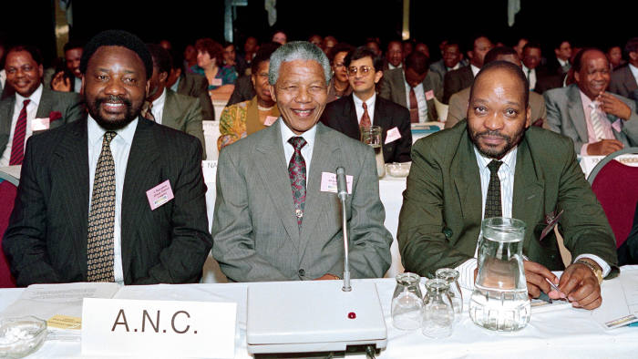 (from left), Cyril Ramaphosa, Nelson Mandela and Jacob Zuma, representatives of the African National Congress (ANC) attend a two-day Convention for a Democratic South Africa (CODESA), on December 20, 1991, in Johannesburg. AFP PHOTO WALTER DHLADHLA / AFP PHOTO / WALTER DHLADHLA (Photo credit should read WALTER DHLADHLA/AFP/Getty Images)