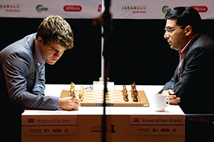Viswanathan Anand plays Magnus Carlsen during the second round of the Norway Chess 2013