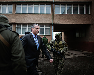 New prime minister Sergei Aksyonov inspects the Crimean army