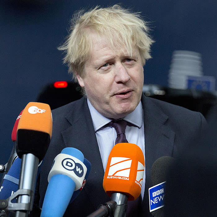 British Foreign Secretary Boris Johnson speaks with the media as he arrives for a meeting of EU foreign ministers at the Europa building in Brussels on Monday, March 19, 2018. European Union foreign ministers on Monday are set to discuss Ukraine, Syria, Korea and Iran. (AP Photo/Virginia Mayo)