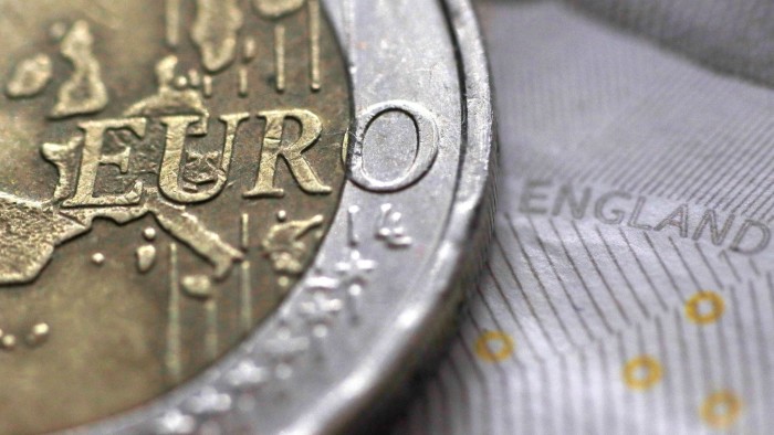 A two Euro coin is pictured next to an English ten Pound note in an illustration taken March 16, 2016. REUTERS/Phil Noble/Illustration/File Photo