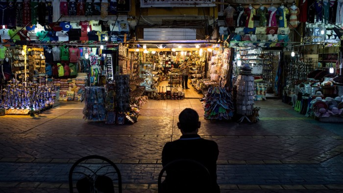 SHARM EL SHEIKH, EGYPT - APRIL 03: A shop owner waits for customers in the Old Market district on April 3, 2016 in Sharm El Sheikh, Egypt. Prior to the Arab Spring in 2011 some 15million tourists would visit Egypt each year. The resort town of Sharm El Sheikh was built around tourism however tourist numbers have plummeted after recent terrorist attacks with flights from major UK carriers being suspended and foreign offices around the world warning citizens of the 'High threat from terrorism' Sharm El Sheikh is almost a ghost town, with many resorts being abandoned and business forced to close. (Photo by Chris McGrath/Getty Images)