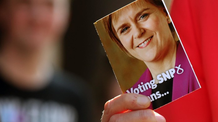SNP leader and Scotland's First Minister Nicola Sturgeon holds an election leaflet on the election campaign trail in Stirling. PRESS ASSOCIATION Photo. Picture date: Friday April 10, 2015. Photo credit should read: Andrew Milligan/PA Wire