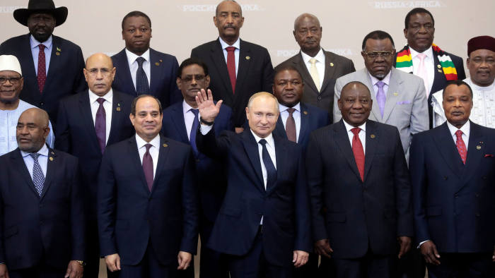 Mandatory Credit: Photo by SERGEI CHIRIKOV/POOL/EPA-EFE/Shutterstock (10455019l) Russia's President Vladimir Putin (C) waves during a family photo with heads of countries taking part in the 2019 Russia-Africa Summit at the Sirius Park of Science and Art in Sochi, Russia, 24 October 2019. The Russia-Africa Summit and Economic Forum take place on 23-24 October 2019. Russia-Africa Summit and Economic Forum in Sochi, Russian Federation - 24 Oct 2019