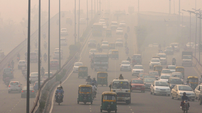 NEW DELHI, INDIA - NOVEMBER 3: People commute amidst smog on a cold morning on November 3, 2015 in New Delhi, India. Air quality in surrounding areas of Delhi has dropped dramatically due to practice of burning of crop residues. According to reports, satellite image from NASA‚Äôs Earth Observing System Data and Information System (EOSDIS) website recently showed fire spots, which denote blazes on the ground, all across Punjab and parts of northern Haryana. Deterioration in air quality is aggravating respiratory problems. (Photo by Sonu Mehta/Hindustan Times via Getty Images)