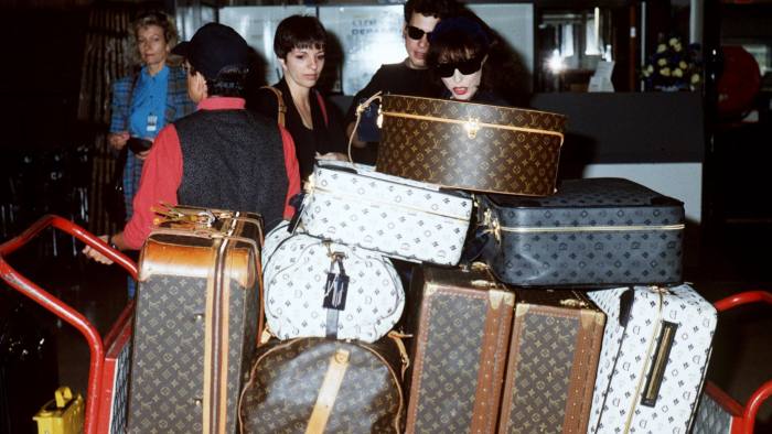Mandatory Credit: Photo by Dennis Stone/REX/Shutterstock (201985a) LIZA MINNELLI AND JOAN COLLINS STARS AT HEATHROW AIRPORT, LONDON, BRITAIN - 1992