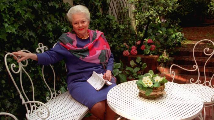 ADVANCE FOR WEEKEND EDITIONS, MAY 23-25 -- Olivia de Havilland, the Oscar-winning actress who played the charitable and loving Melanie in "Gone With The Wind", sits in the garden ofher Paris home, April 15, 1997. Although de Havilland has not acted since 1988, when she appeared in a television movie "The Woman He Loved," she insists she is not retired. (AP Photo/Michel Lipchitz)