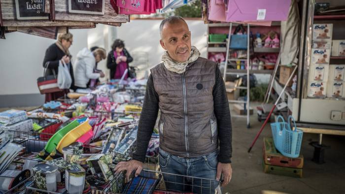 Picture by Charlie Bibby for the Financial Times Europopulism with James Politi in Cascina, Italy. Roberto Luppichini at the market in Navacchio
