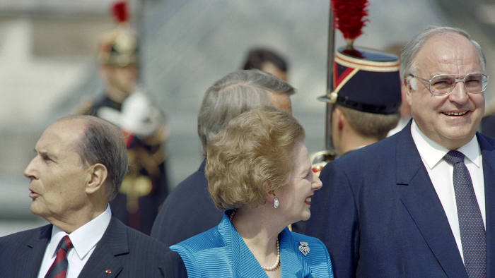 French President François Mitterrand, British Prime Minister Margaret Thatcher and German Chancellor Helmut Kohl on July 14, 1989 at the G7 summit in Paris.