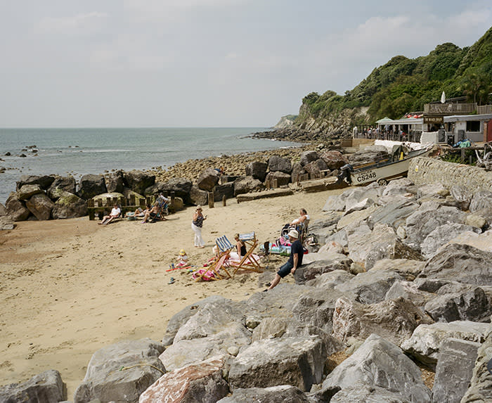 Families on the beach at Steephill Cove, Ventnor, Isle of Wight, June 2018.