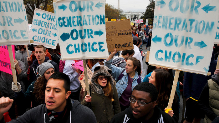 Students participate in the 'Our Generation, Our Choice' protest near the White House in Washington November 9, 2015. The Monday march to highlight race, climate, and immigration issues was timed to mark exactly one year until the 2016 U.S. presidential election, according to protesters. REUTERS/Jonathan Ernst TPX IMAGES OF THE DAY - GF20000052126