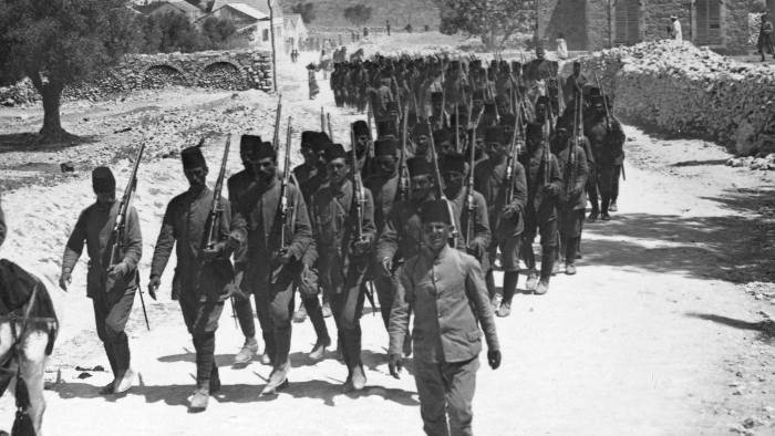 Defeated Turkish soldiers on the march in Palestine c1917