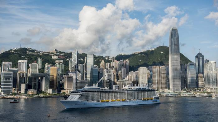 The Quantum of the Seas cruise ship, operated by Royal Caribbean Cruises Ltd., sails through Victoria Harbor in Hong Kong, China, on Saturday, June 20, 2015. Hong Kong faces a prolonged political impasse after pro-democratic lawmakers rejected a China-backed plan for its political future and scuttled the Asian financial hub's first leadership election. Photographer: Xaume Olleros/Bloomberg