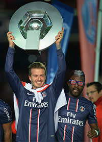 David Beckham lifts the Ligue 1 trophy