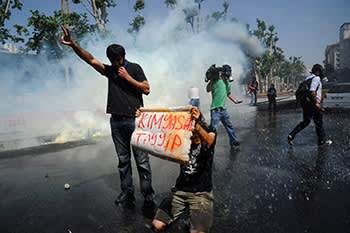 A protester in Taksim Square, Istanbul holds up a placard reading “Chemical Tayyip”, a reference to the use of tear gas by forces under the control of Recep Tayyip Erdogan, then prime minister
