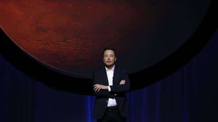 Elon Musk, chief executive officer for Space Exploration Technologies Corp. (SpaceX), pauses during the 67th International Astronautical Congress (IAC) in Guadalajara, Mexico, on Tuesday, Sept. 27, 2016. Musk delivered a keynote address at the conference titled "Making Humans a Multiplanetary Species" and tackled the technical challenges and "potential architectures for colonizing the Red Planet." Photographer: Susana Gonzalez/Bloomberg