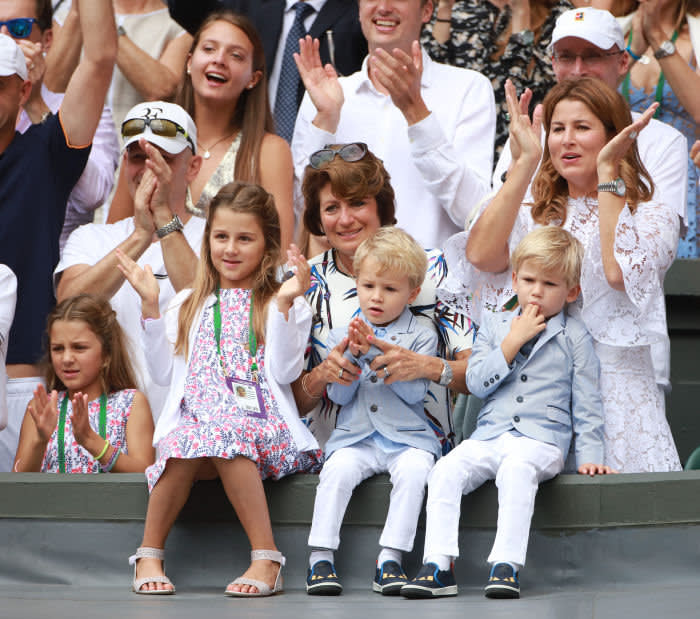 Roger Federer's wife Mirka (right) and their four children