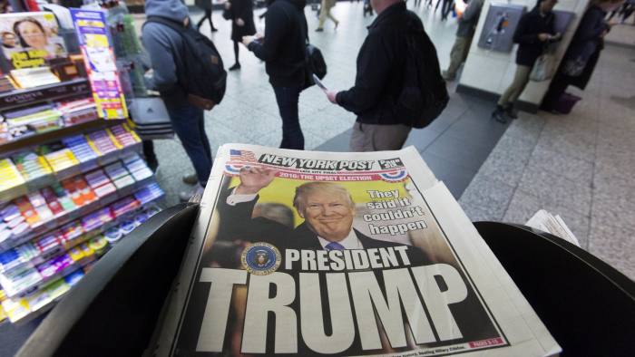 The New York Post newspaper featuring president-elect Donald Trump's victory is displayed at a newsstand, Wednesday, Nov. 9, 2016 in New York. Donald Trump claimed his place Wednesday as America's 45th president, an astonishing victory for the celebrity businessman and political novice who capitalized on voters' economic anxieties, took advantage of racial tensions and overcame a string of sexual assault allegations on his way to the White House. (AP Photo/Mark Lennihan)