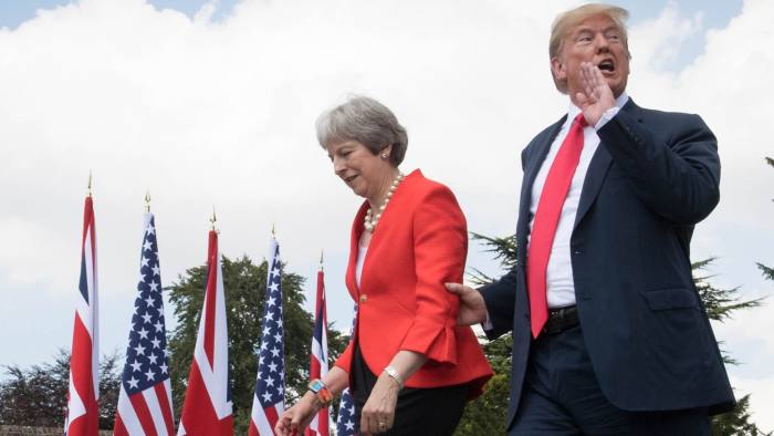 US President Donald Trump walks with Prime Minister Theresa May prior to a joint press conference at Chequers, her country residence in Buckinghamshire. PRESS ASSOCIATION Photo. Picture date: Friday July 13, 2018. See PA story POLITICS Trump. Photo credit should read: Stefan Rousseau/PA Wire