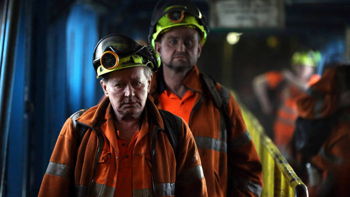Coal miners finish the final shift before closure at the Kellingley Colliery in Yorkshire, northern England, on December 18, 2015. The shutdown of the mine in Yorkshire in northern England closes a 200-year chapter of Britain's industrial history. AFP PHOTO / POOL / NIGEL RODDIS / AFP / POOL / NIGEL RODDIS (Photo credit should read NIGEL RODDIS/AFP/Getty Images)