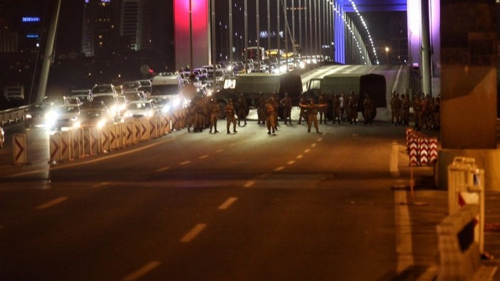 ISTANBUL, TURKEY - JULY 15: Turkish soldiers block Istanbul's Bosphorus Brigde on July 15, 2016 in Istanbul, Turkey. Istanbul's bridges across the Bosphorus, the strait separating the European and Asian sides of the city, have been closed to traffic. Reports have suggested that a group within Turkey's military have attempted to overthrow the government. Security forces have been called in as Turkey's Prime Minister Binali Yildirim denounced an &quot;illegal action&quot; by a military &quot;group&quot;, with bridges closed in Istanbul and aircraft flying low over the capital of Ankara. (Photo by Gokhan Tan/Getty Images)