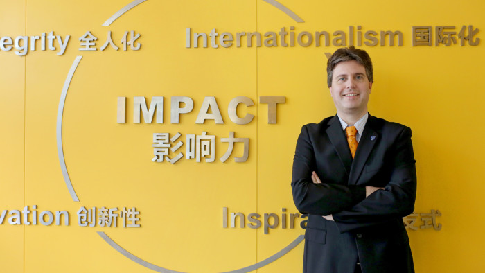 Dr Florian Dohlbacher, Associate Professor of Marketing and Innovation, poses at the International Business School Suzhou (IBSS) of XJTLU (Xi'an Jiaotong-Liverpool University) in Suzhou city, east China's Jiangsu province, 6 March 2015.