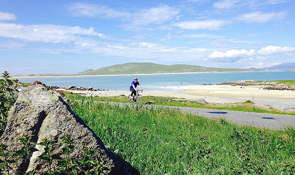 Will Hide cycles past the beach on Barra 