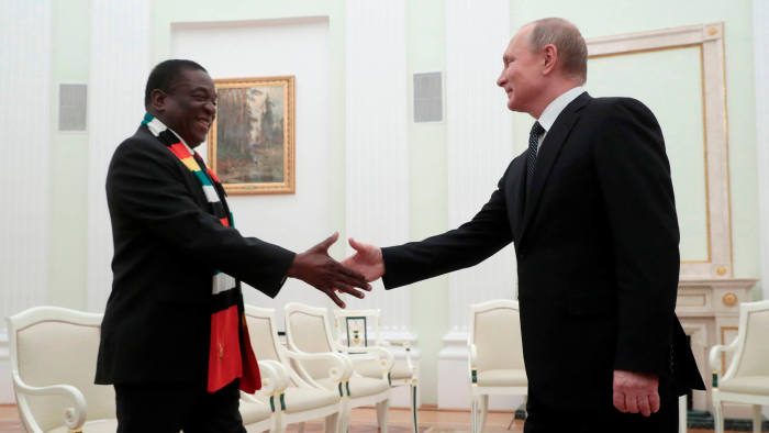 Russian President Vladimir Putin (R) shakes hands with his Zimbabwean counterpart Emmerson Mnangagwa during a meeting at the Kremlin in Moscow on January 15, 2019. (Photo by SERGEI CHIRIKOV / POOL / AFP)SERGEI CHIRIKOV/AFP/Getty Images