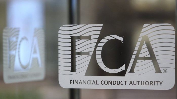 A logo sits on a glass revolving door at the Financial Conduct Authority (FCA) in the Canary Wharf business district in London, U.K., on Thursday. Nov. 21, 2013. The FCA is working with regulators including the U.S. Department of Justice and the Commodity Futures Trading Commission to investigate the potential manipulation of the foreign-exchange market. Photographer: Chris Ratcliffe/Bloomberg 