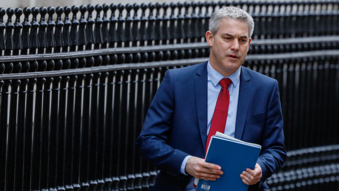 Stephen Barclay, U.K. exiting the European Union (EU) secretary, departs Downing Street to attend a weekly questions and answers session in Parliament in London, U.K., on Wednesday, March 27, 2019. U.K. Prime Minister Theresa May aims to put her twice-defeated Brexit deal to another vote this week, amid signs some Brexit hardliners might be willing to back it. Photographer: Luke MacGregor/Bloomberg