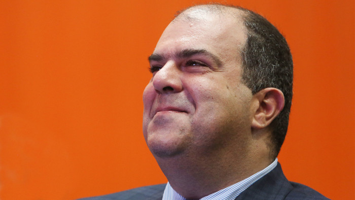 Stelios Haji-Ioannou, founder of EasyJet Plc, listens to speakers at the EasyJet 20th anniversary event in Luton, U.K., on Tuesday, Nov. 10, 2015