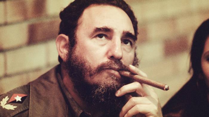 HAVANA, CUBA -- CIRCA 1977: Fidel Castro smokes a cigar in his office in Havana, Cuba, circa 1977. (Photo by David Hume Kennerly/Getty Images)