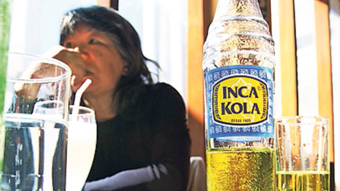 Inca Kola bottle and glass in Peru