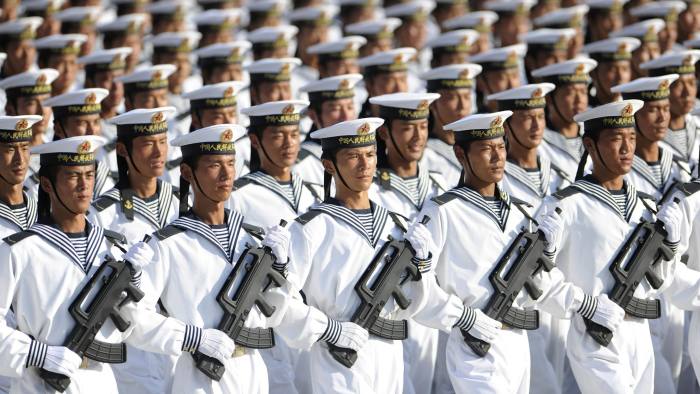 Members of the Chinese People's Liberation Army (PLA) Navy march in formation during a training session at the 60th National Day Parade Village on the outskirts of Beijing September 15, 2009. China will celebrate the 60th anniversary of its founding on October 1. Picture taken September 15, 2009. REUTERS/Joe Chan (CHINA ANNIVERSARY MILITARY POLITICS) CHINA OUT. NO COMMERCIAL OR EDITORIAL SALES IN CHINA - RTXP10F