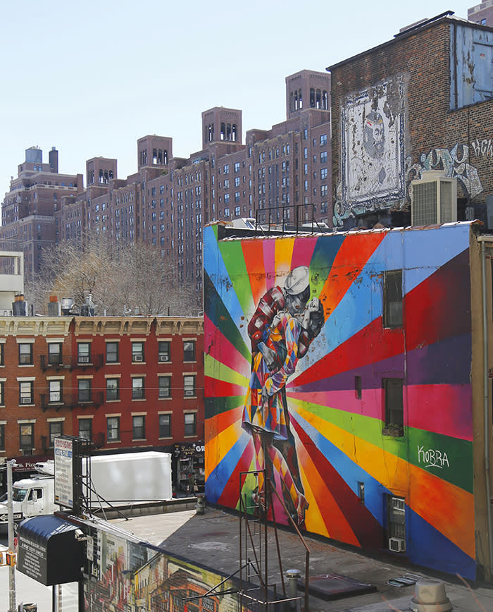 NEW YORK - MARCH 12, 2015: Mural art by Brazilian Mural Artist Eduardo Kobra in Chelsea neighborhood in Manhattan. The mural is based on Alfred Eisenstaedt's 1945 photo from V-J Day in Times Square.; Shutterstock ID 260093771; Department: Picture desk FT House & Home; Job/Project: 22nd February ; Employee Name: Gemma Walters; Other: 1/2 pg