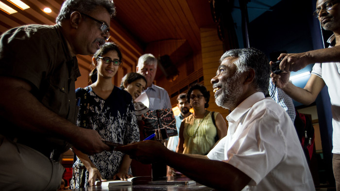Perumal Murugan (right) at a book signing