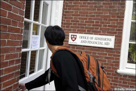 A student walks through a door in a graduate school
