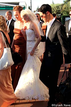 Britta Lazenga arrives at her wedding to Ryan Kavanaugh in July